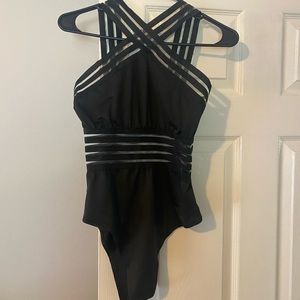Black one piece swimsuit. Amazon. Size L. Never worn.